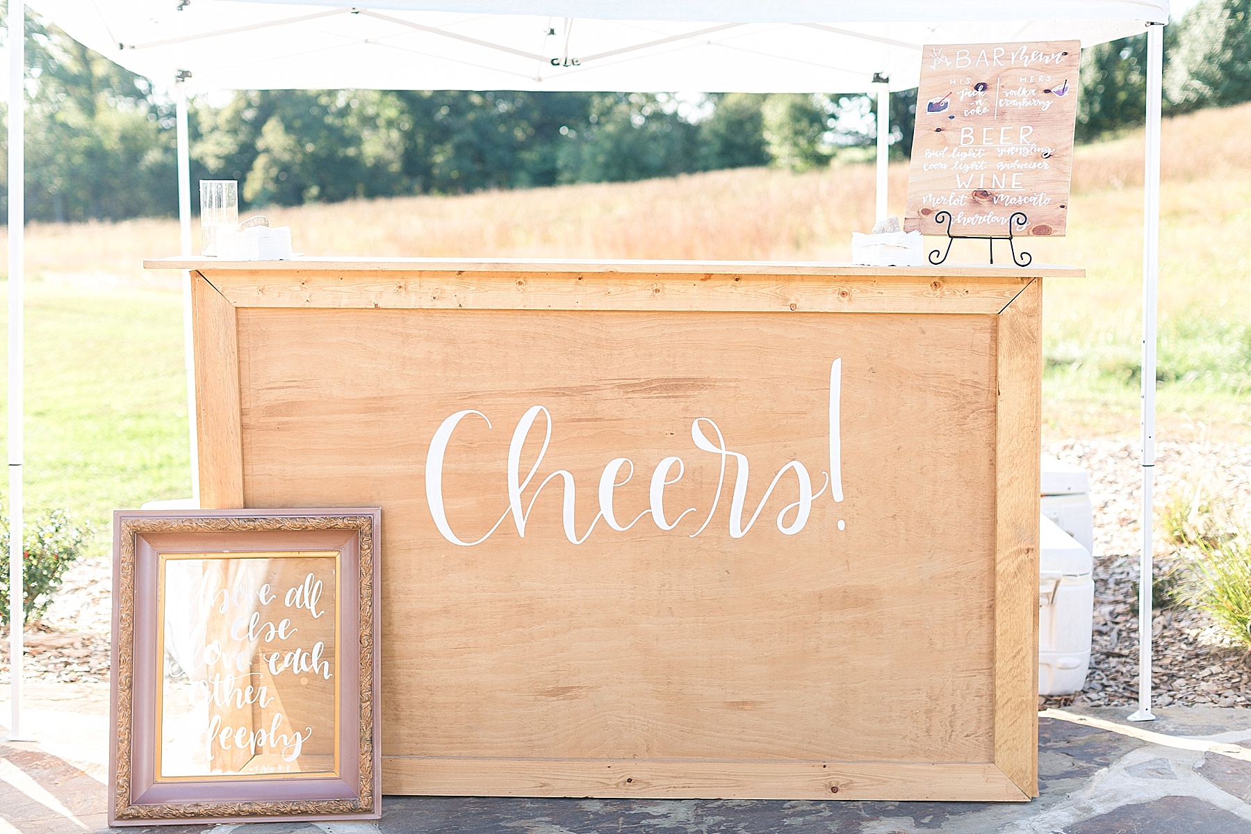 handmade bar for tented reception photographed by Alexandra Mandato Photography