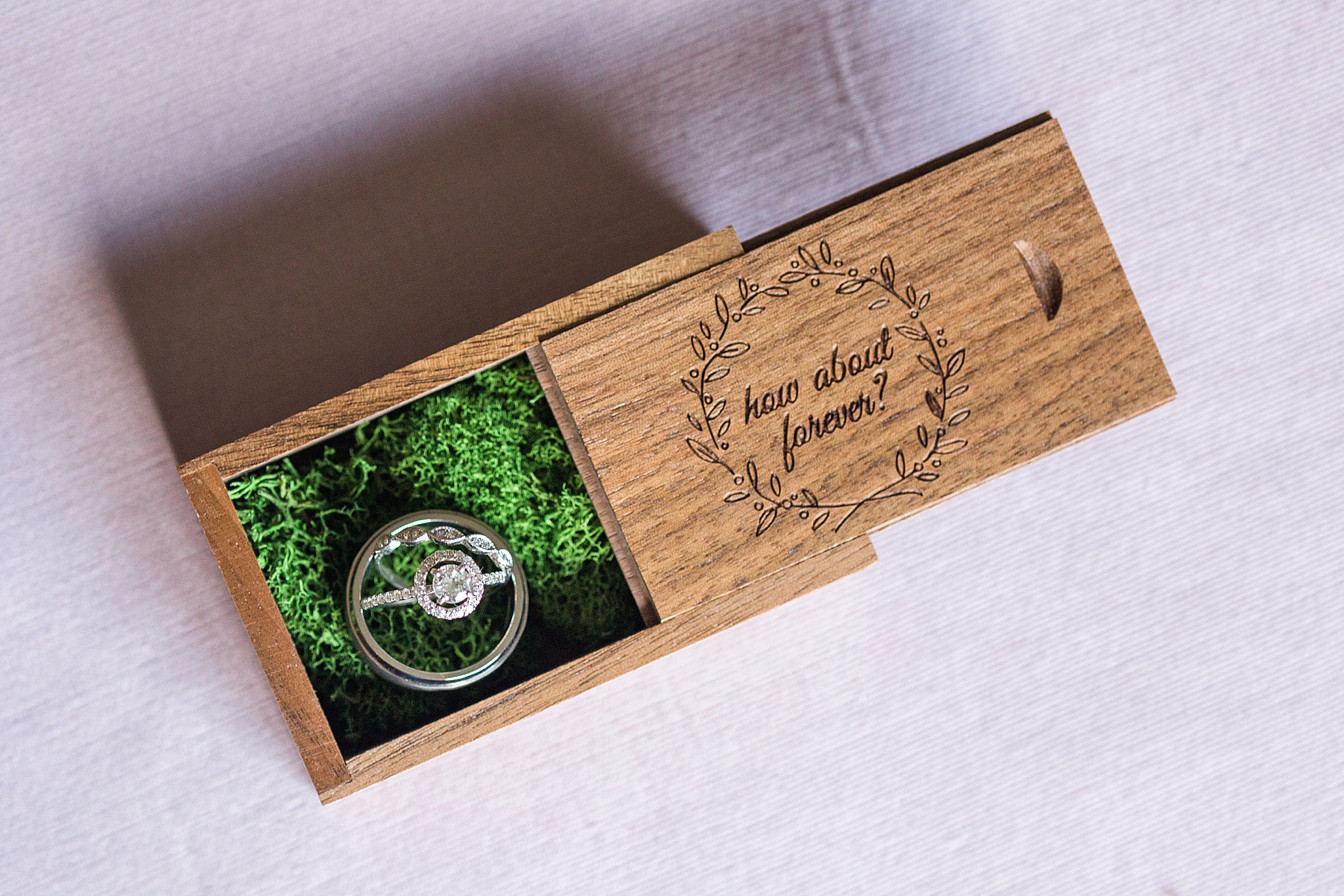 rings in wooden box for summer wedding photographed by Alexandra Mandato Photography