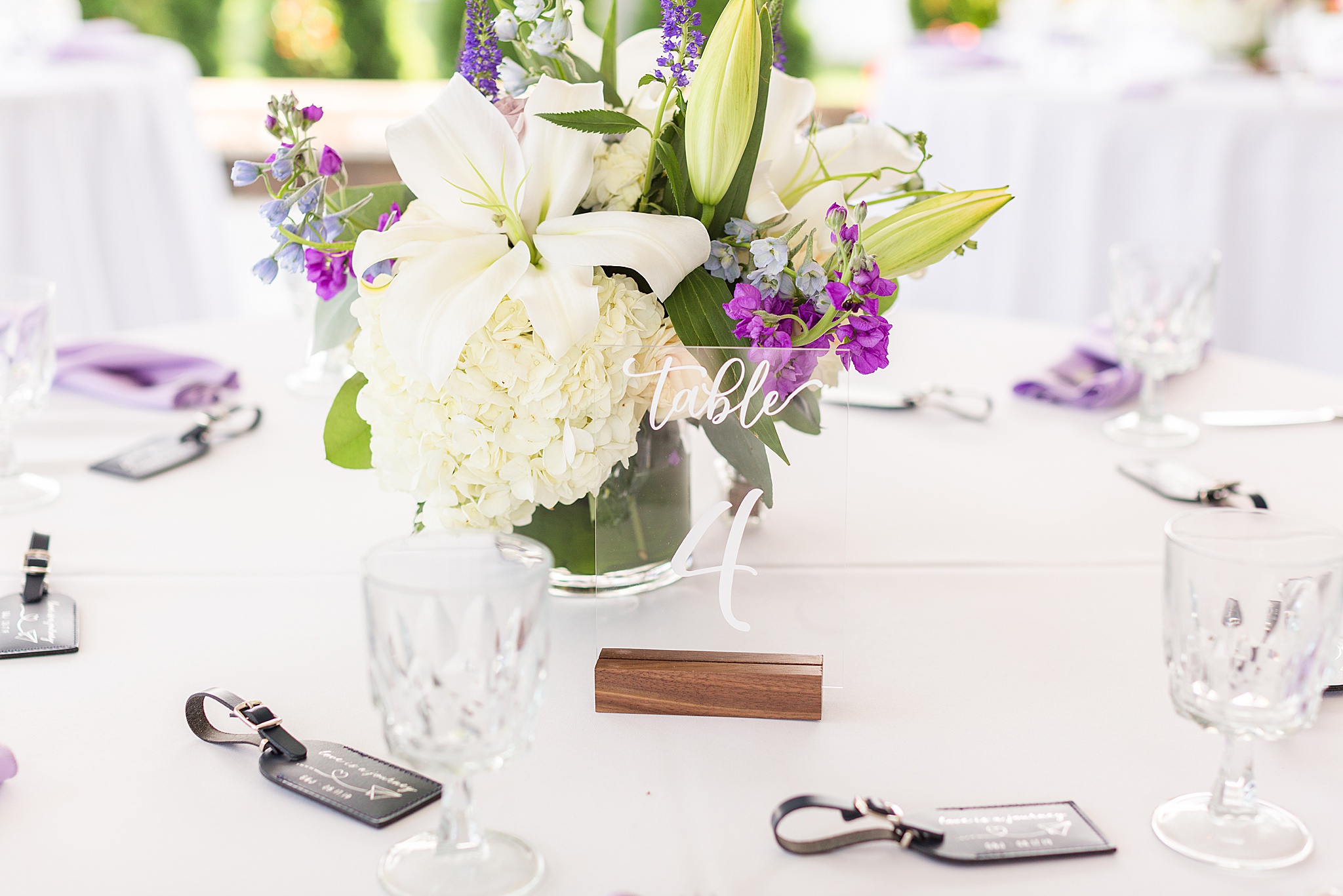 purple and ivory floral centerpieces photographed by Alexandra Mandato Photography