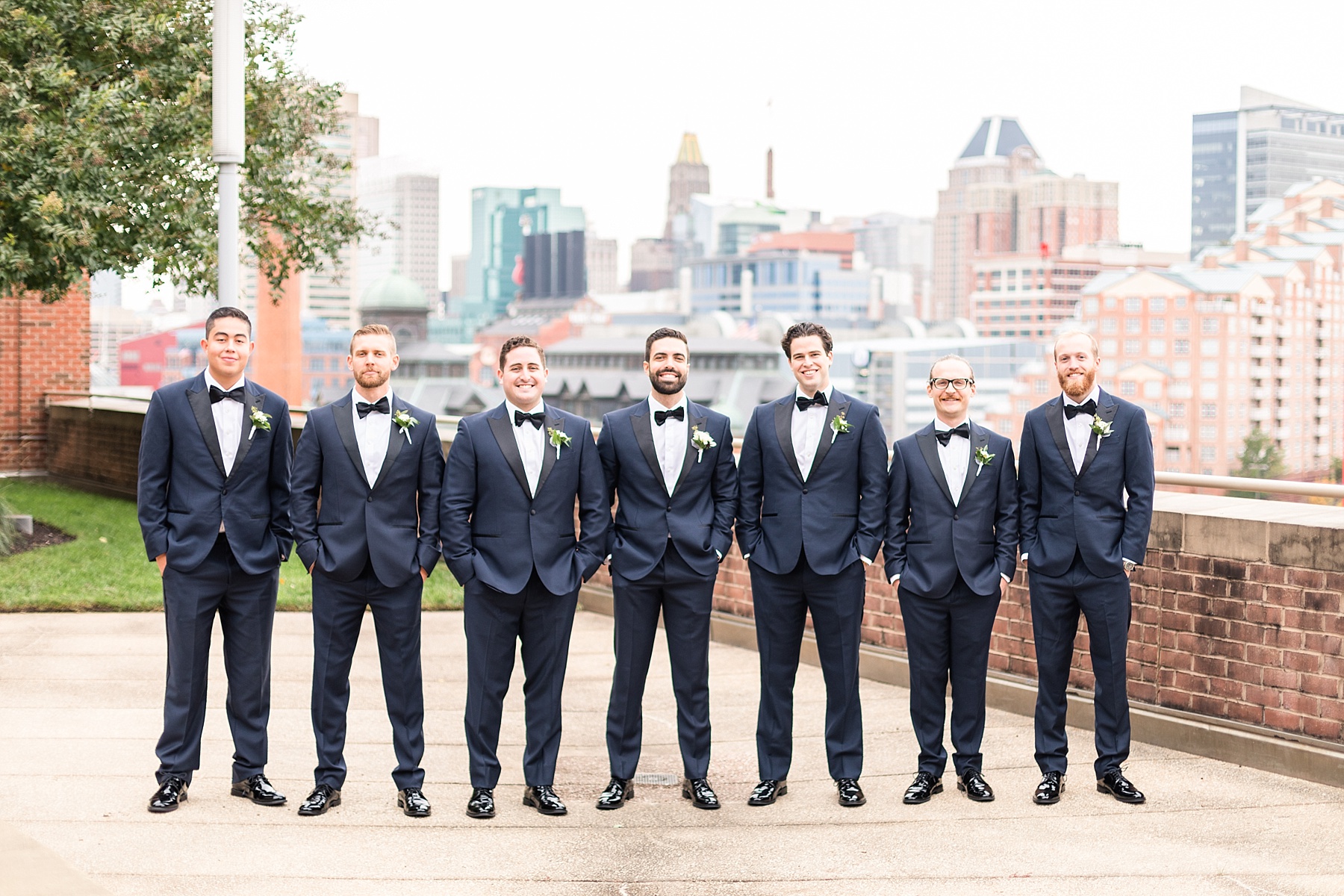 groomsmen portraits along Harbor in Baltimore MD with Alexandra Mandato Photography