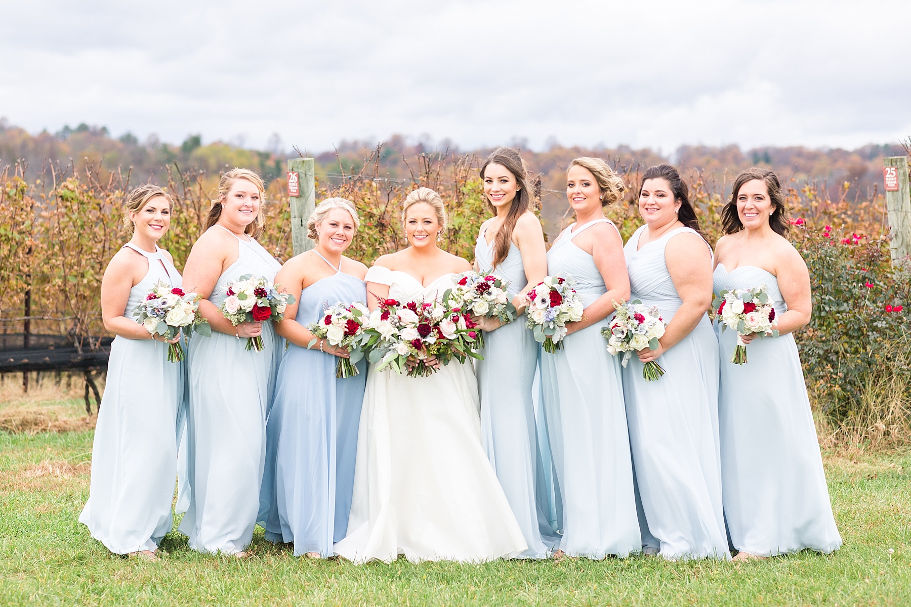 bridesmaids in dusty blue photographed by  Alexandra Mandato Photography