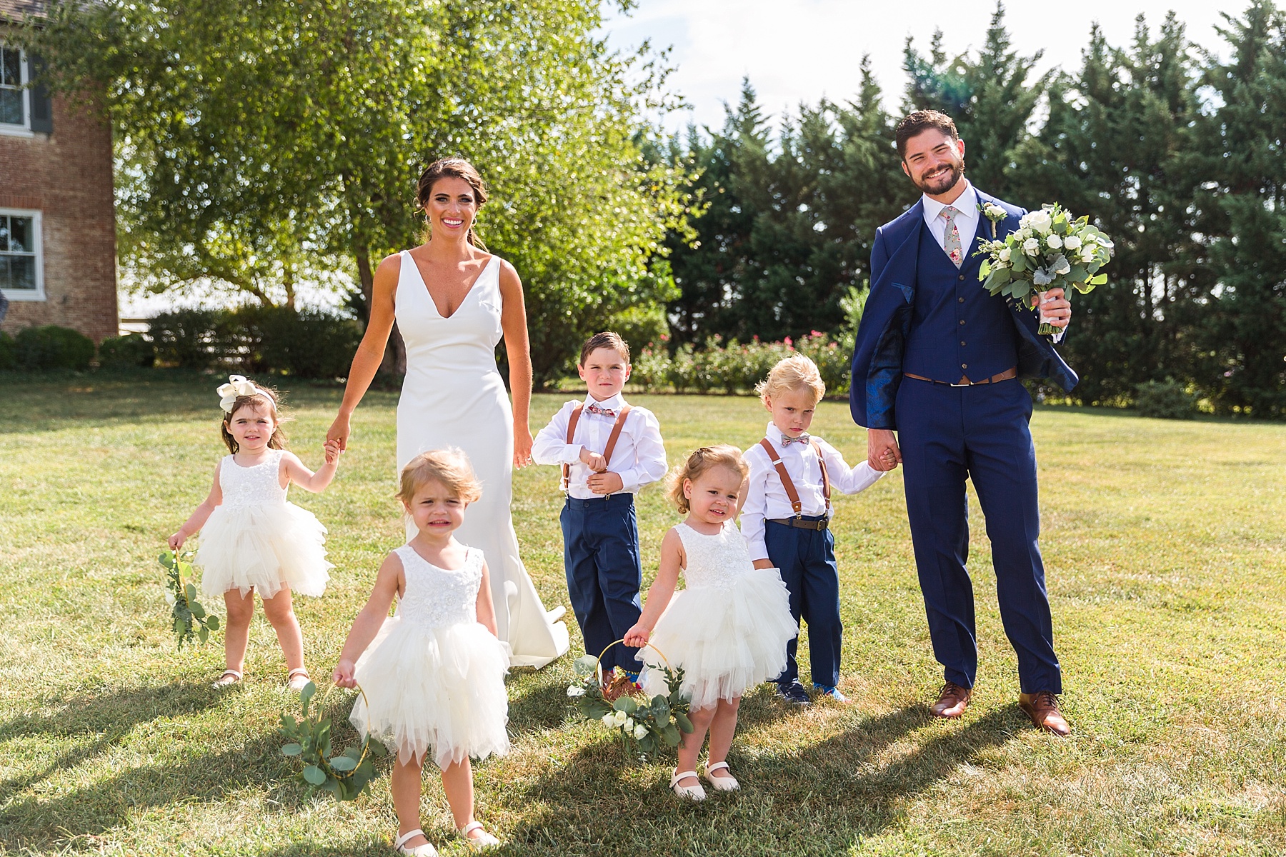 wedding portraits with flower girls and ring bearers