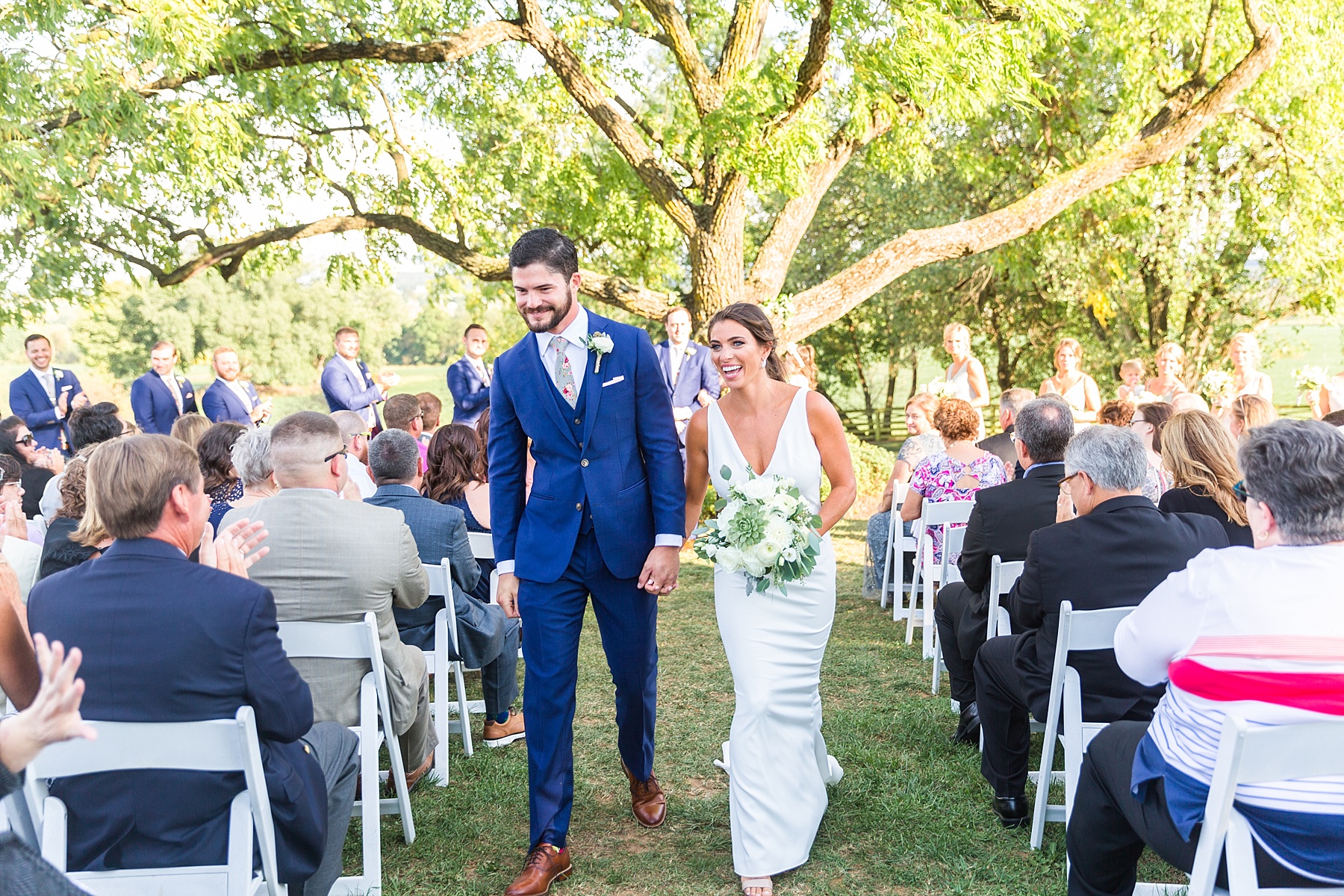 outdoor fall wedding ceremony photographed by Alexandra Mandato Photography