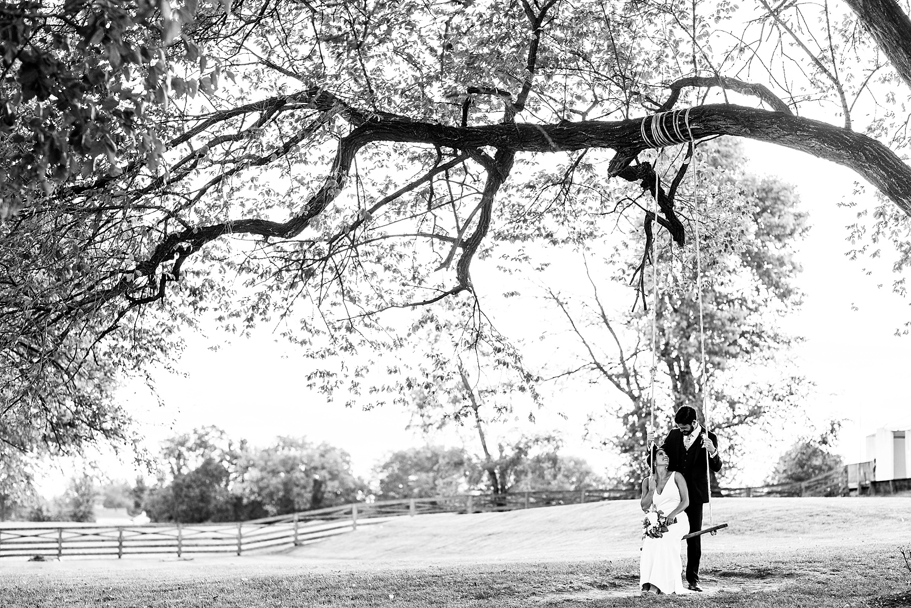 rustic wedding portraits on swing with Alexandra Mandato Photography