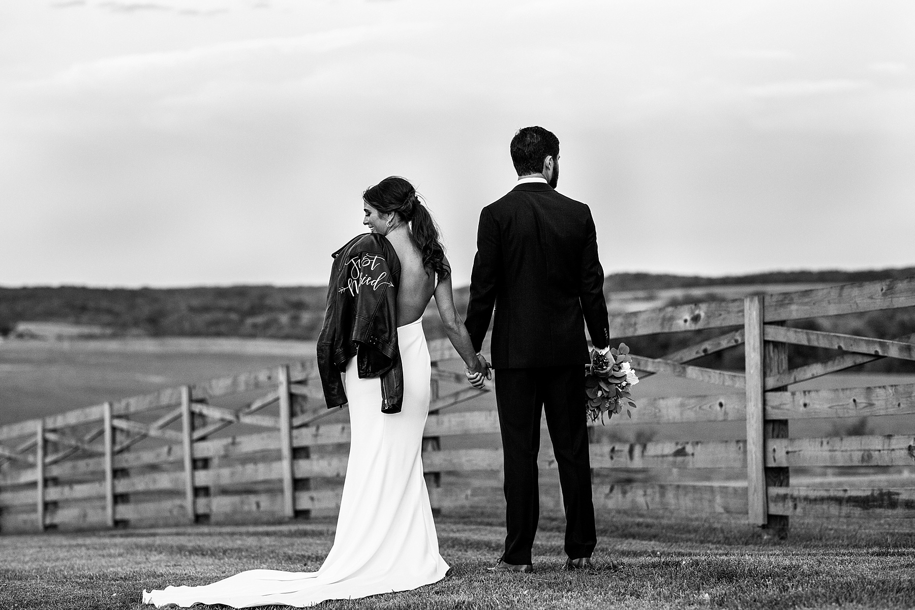 wedding photos with leather jacket photographed by Alexandra Mandato Photography