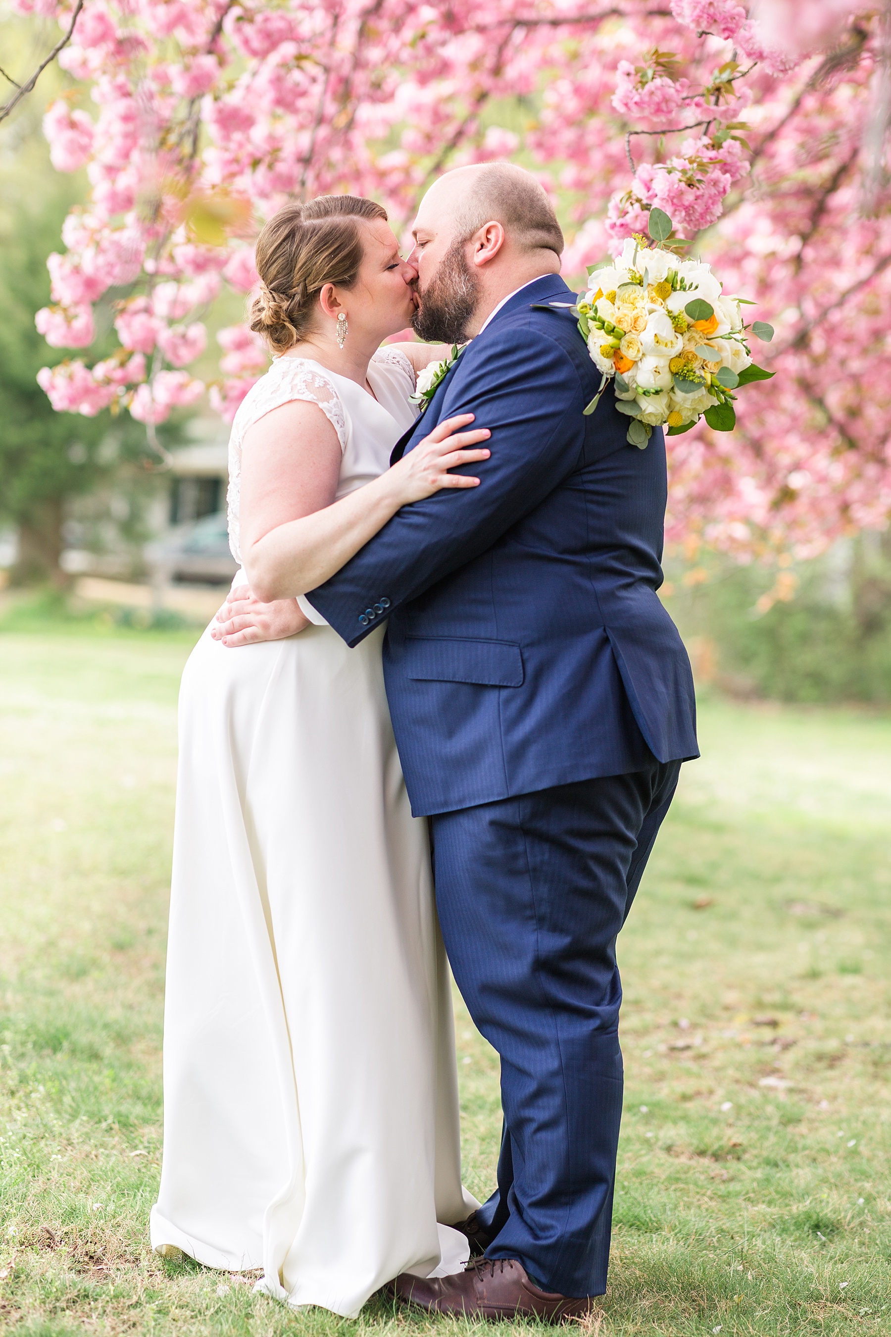 spring time wedding photos in the cherry blossoms with VA wedding photographer Alexandra Mandato Photography