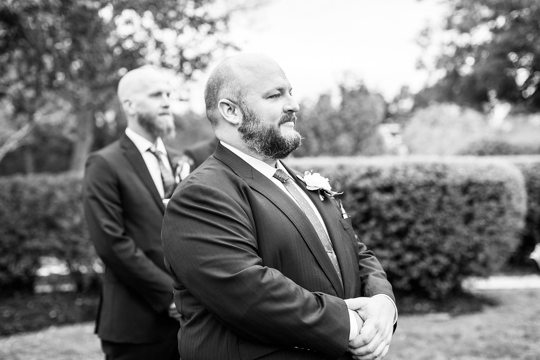 groom watches bride walk down the aisle with Alexandra Mandato Photography