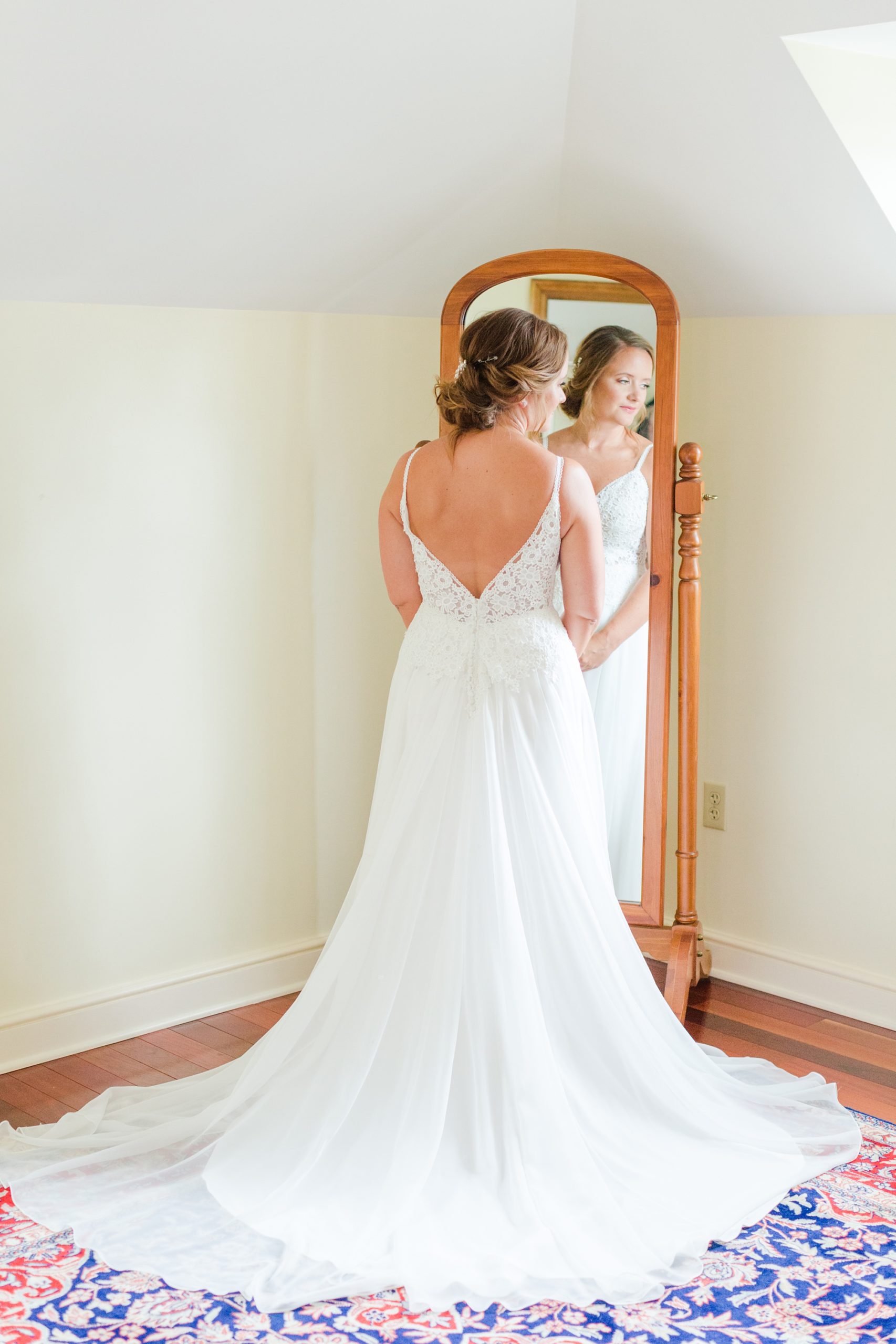 bridal portrait in front of mirror at Drumore Estate