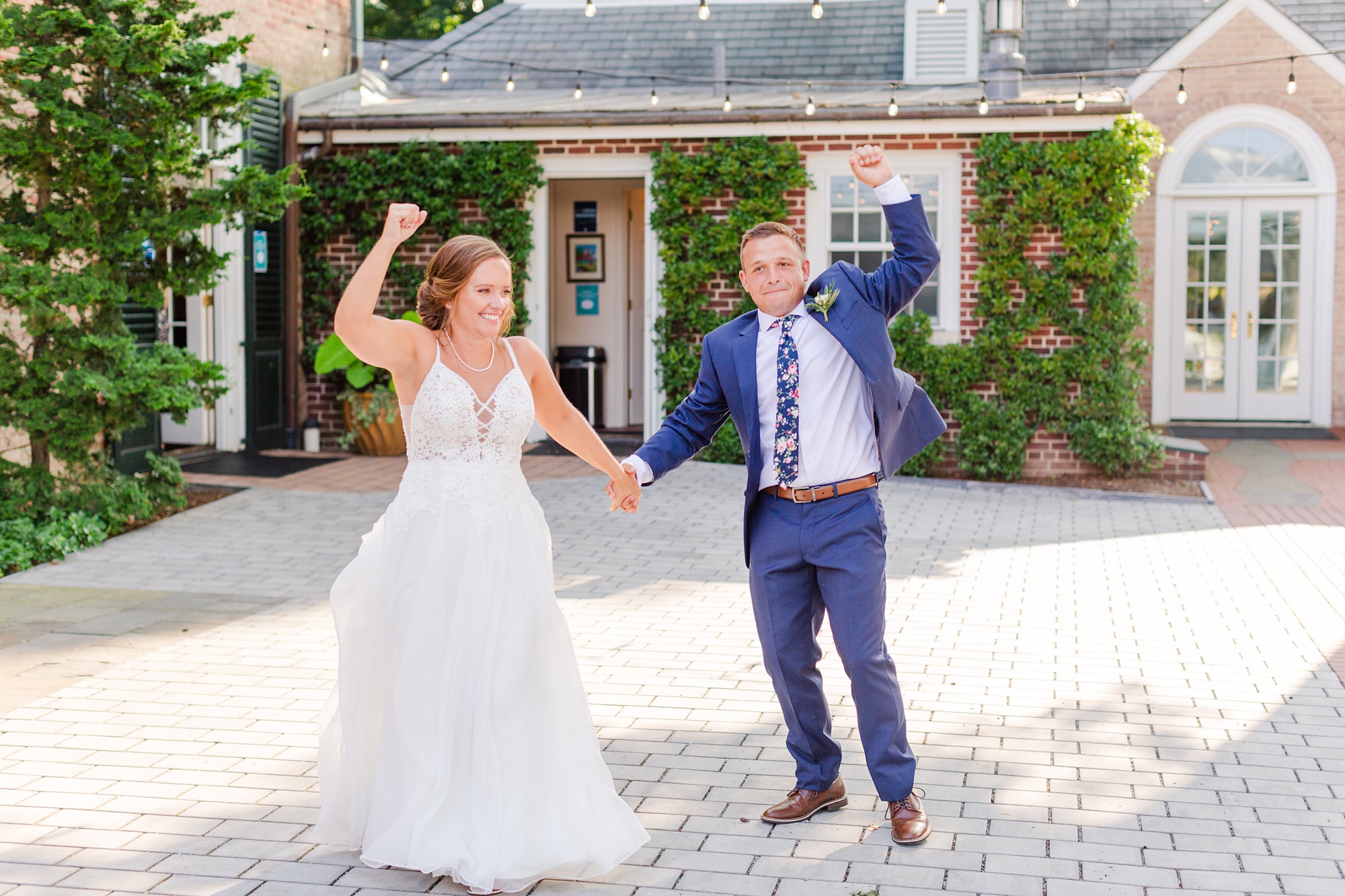 bride and groom enter Drumore Estate wedding reception