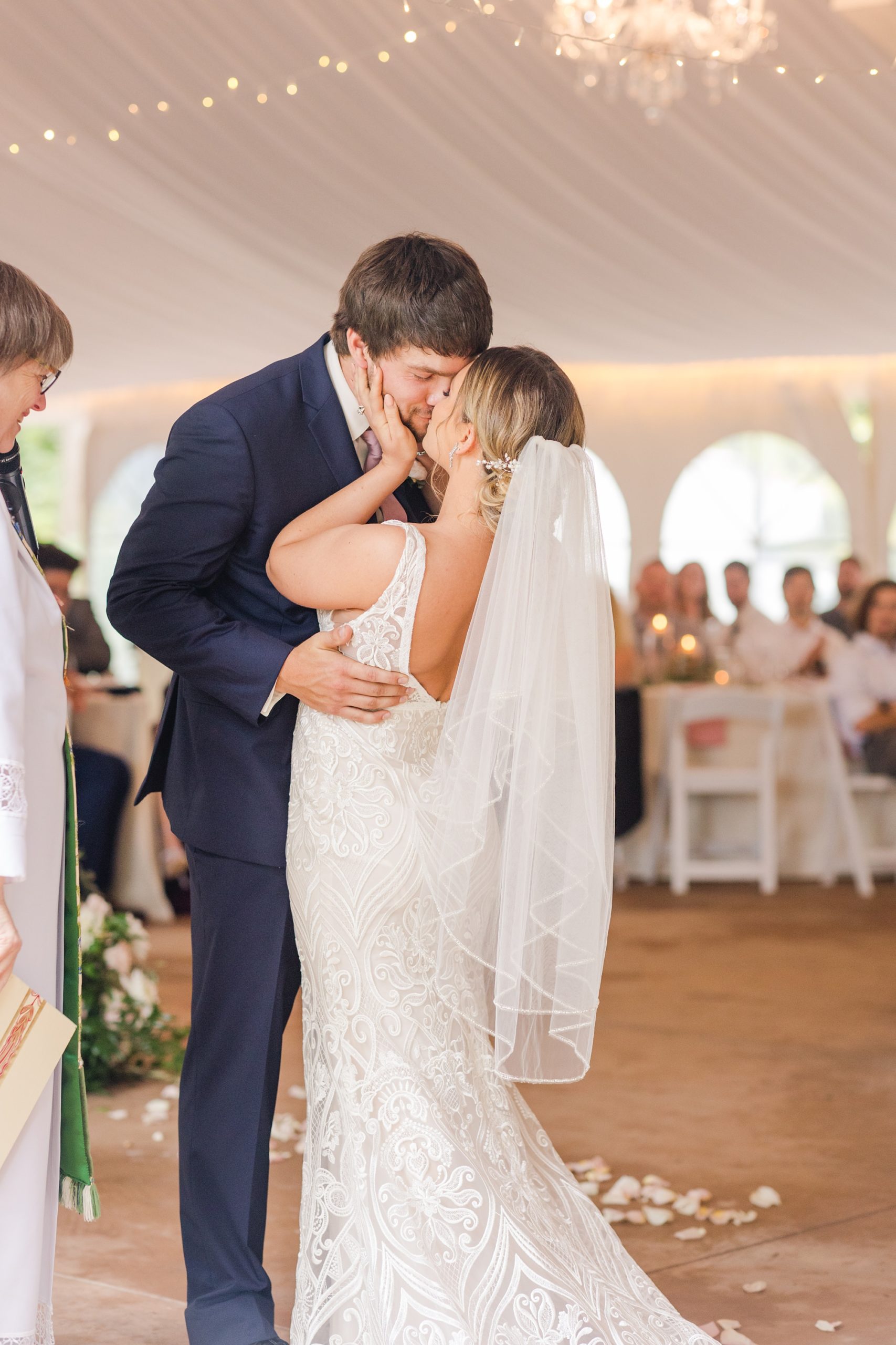 bride and groom kiss during ceremony at Historic Shady Lane