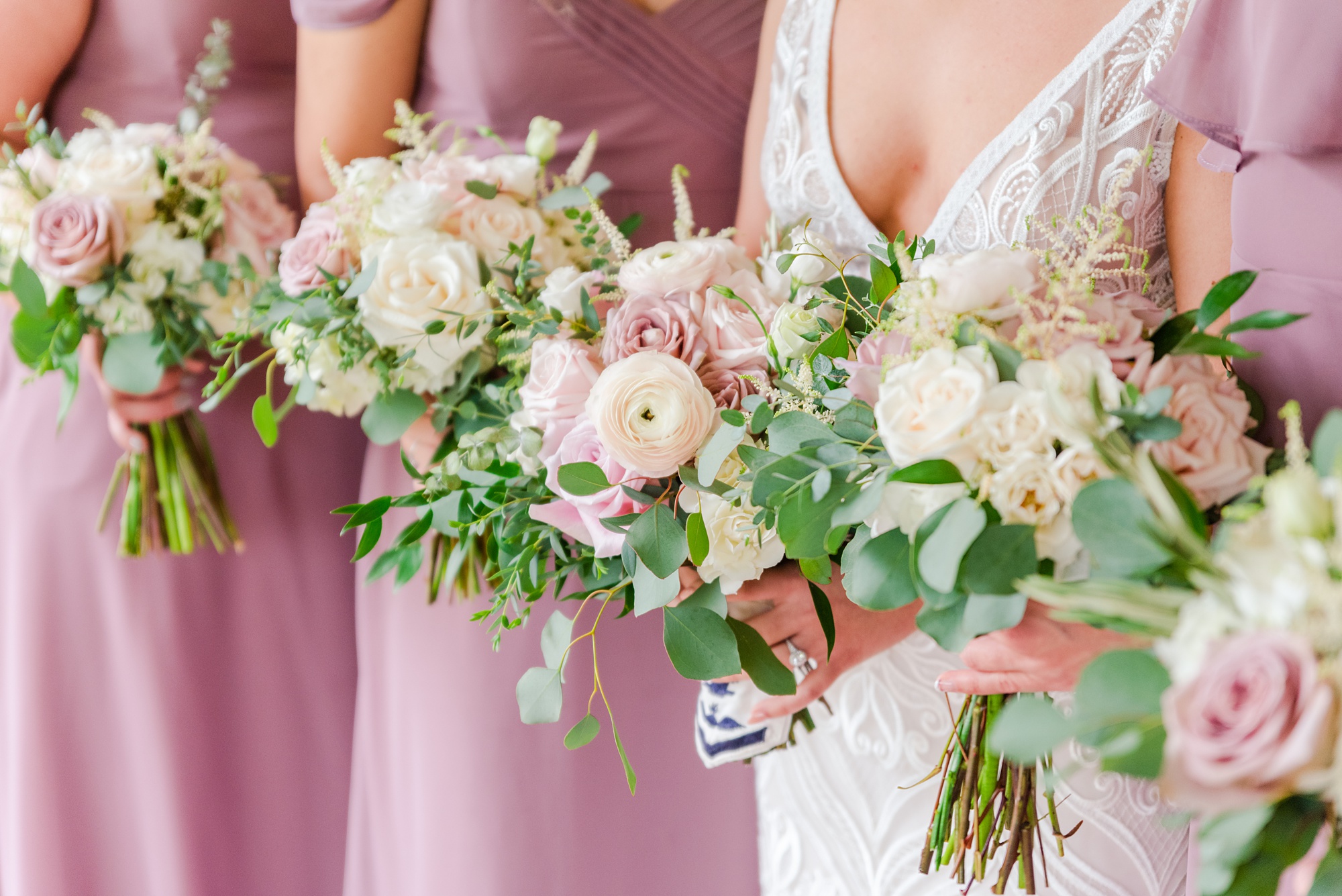 bridesmaids hold mauve bouquet for fall wedding