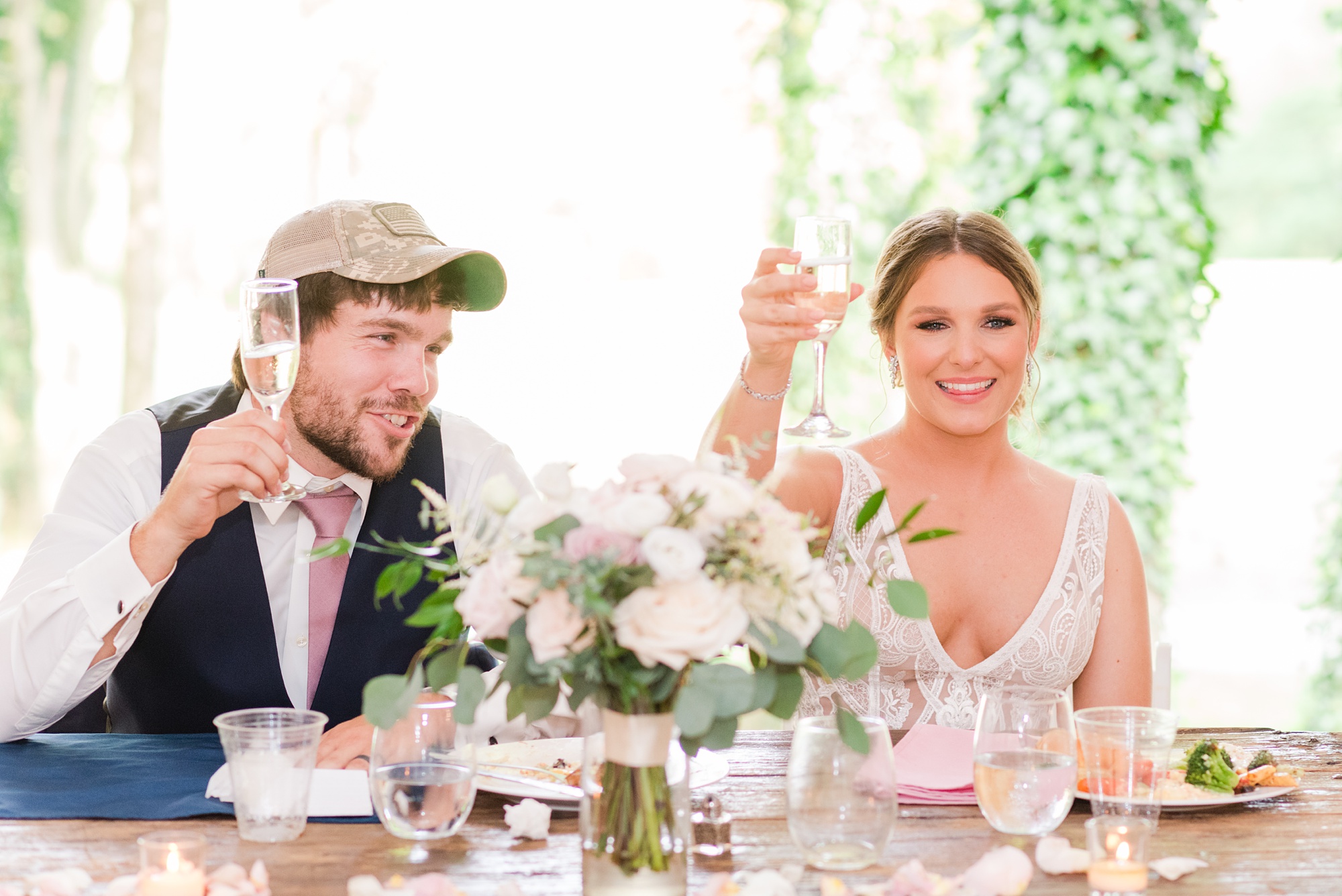 newlyweds toast during Historic Shady Lane wedding reception