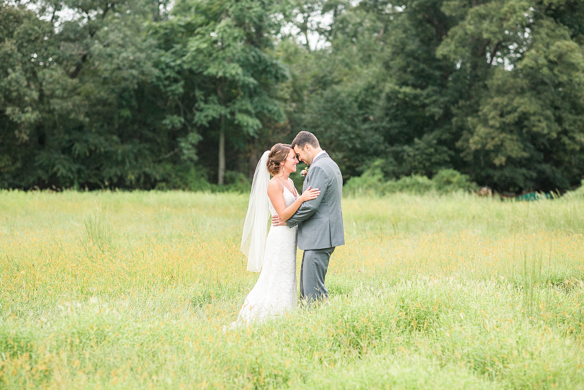 wedding portraits in farm field by Alexandra Mandato Photography