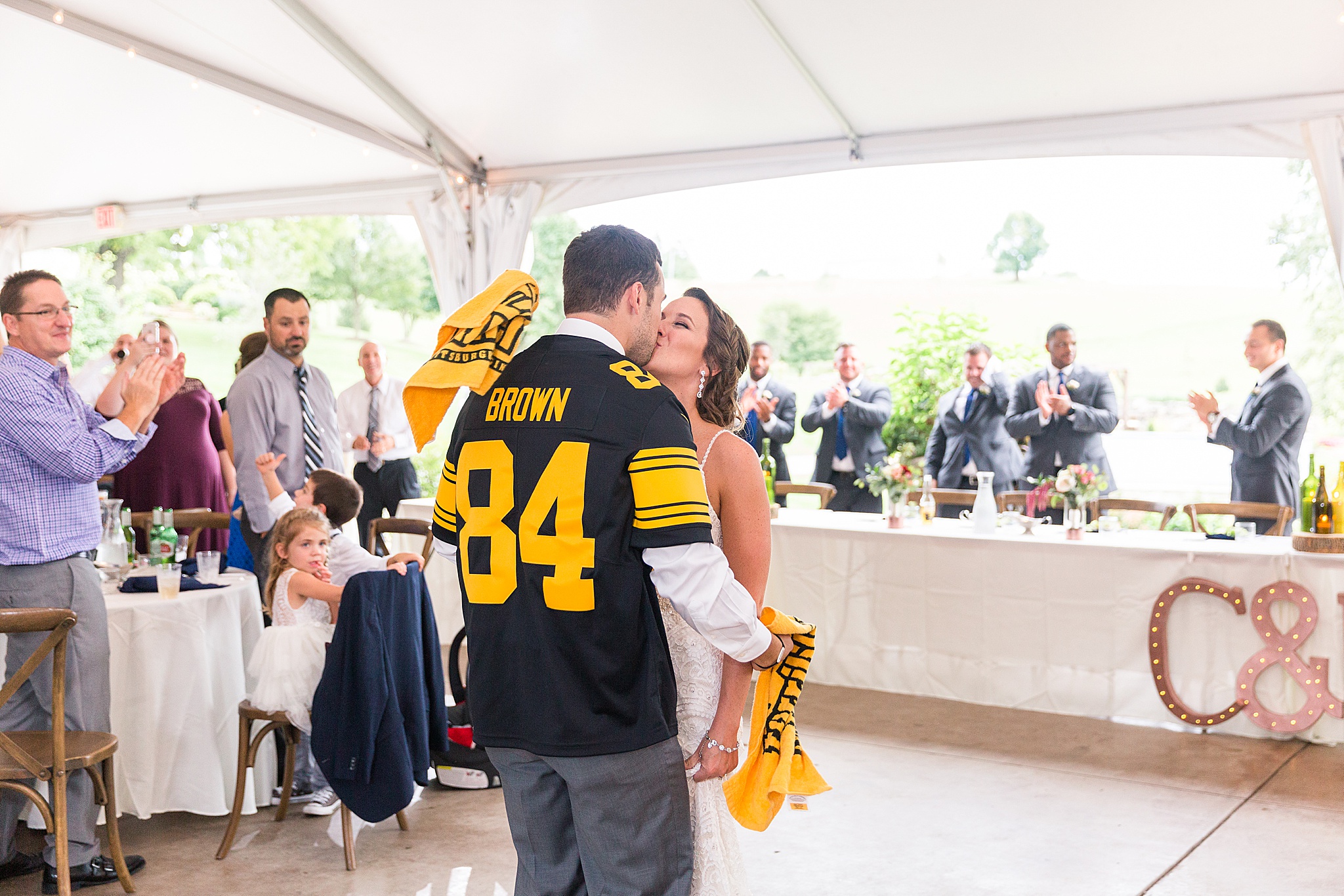 Pittsburgh Steelers wedding reception entrance photographed by Alexandra Mandato Photography