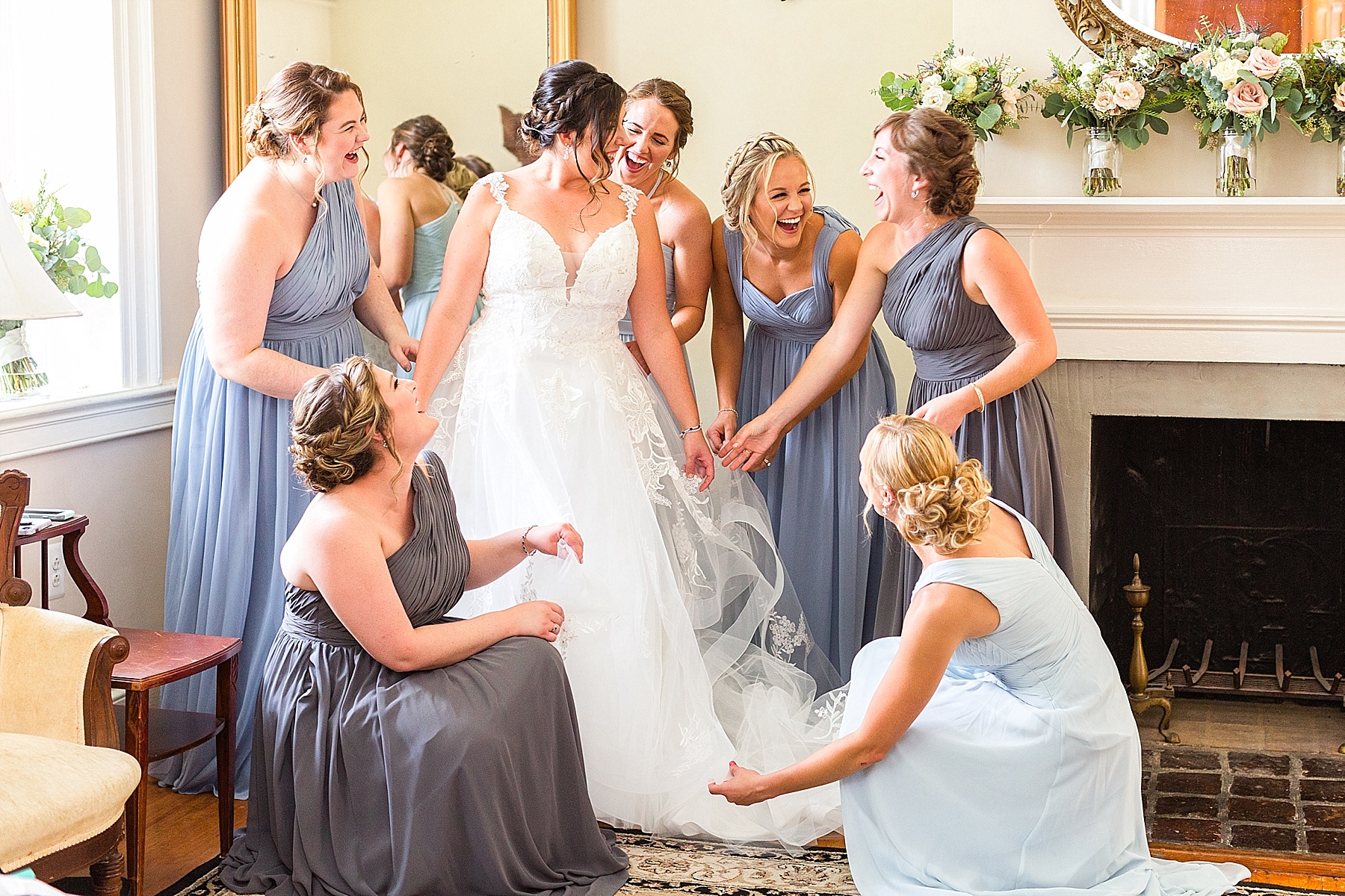 bridesmaids help bride on wedding day at springfield manor with Alexandra Mandato Photography
