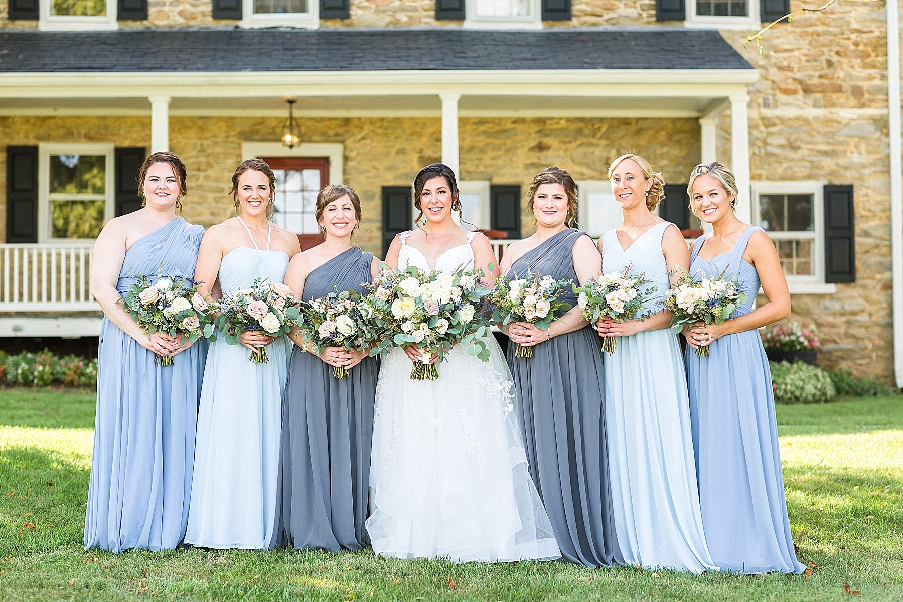 bridesmaids with bride on wedding day at Springfield Manor photographed by Alexandra Mandato Photography