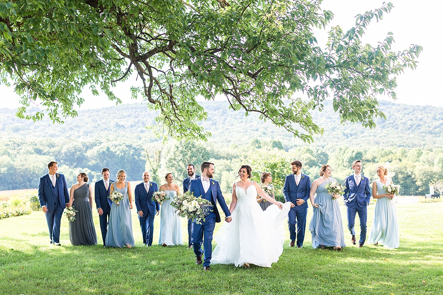 Alexandra Mandato Photography photographs navy blue and dusty blue wedding party attire