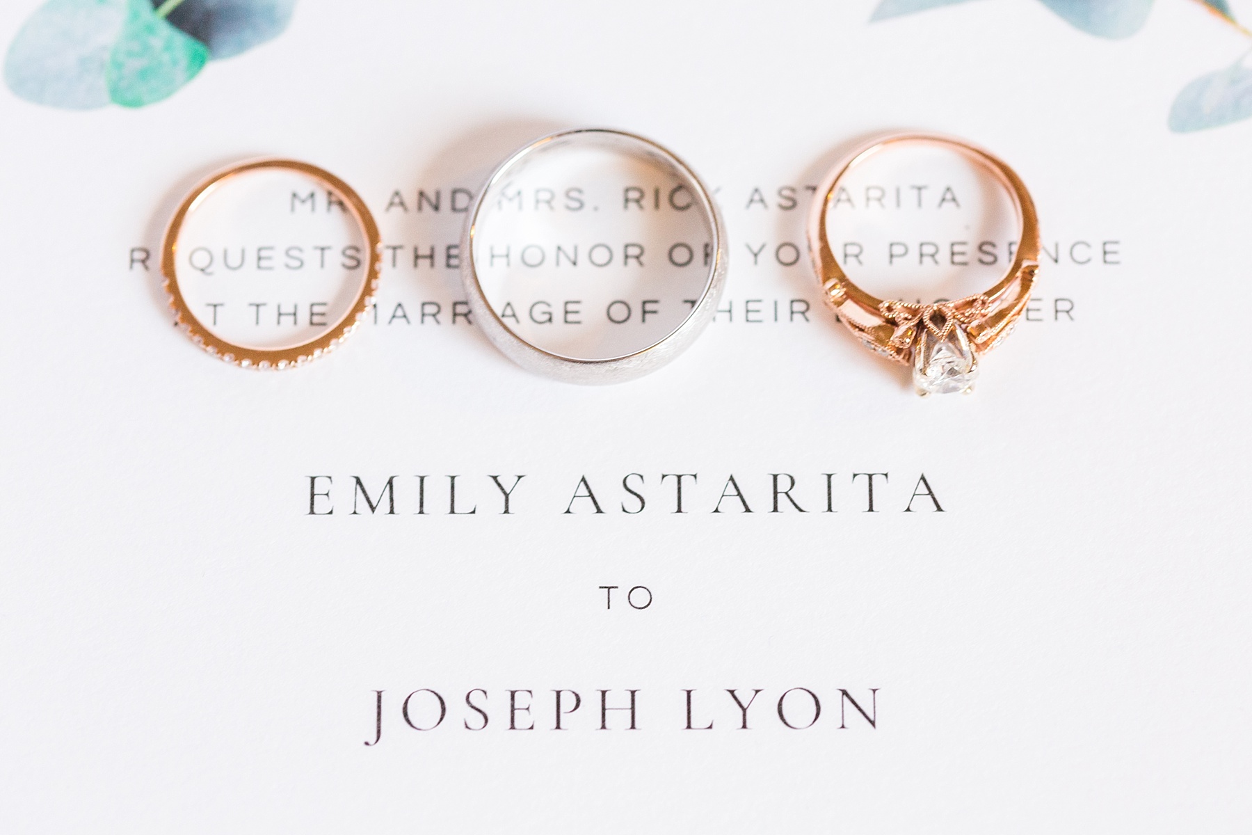 wedding rings on invitation by Alexandra Mandato Photography