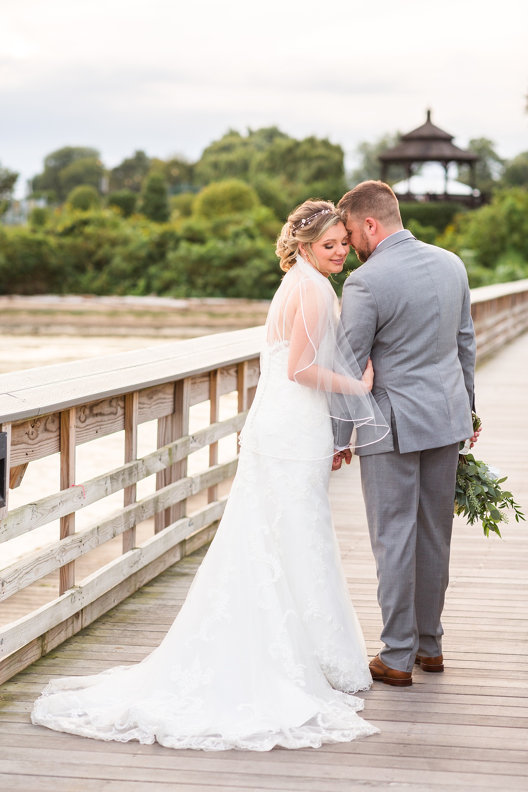 wedding photographer Alexandra Mandato Photography captures bride and groom at Swan Harbor Farm