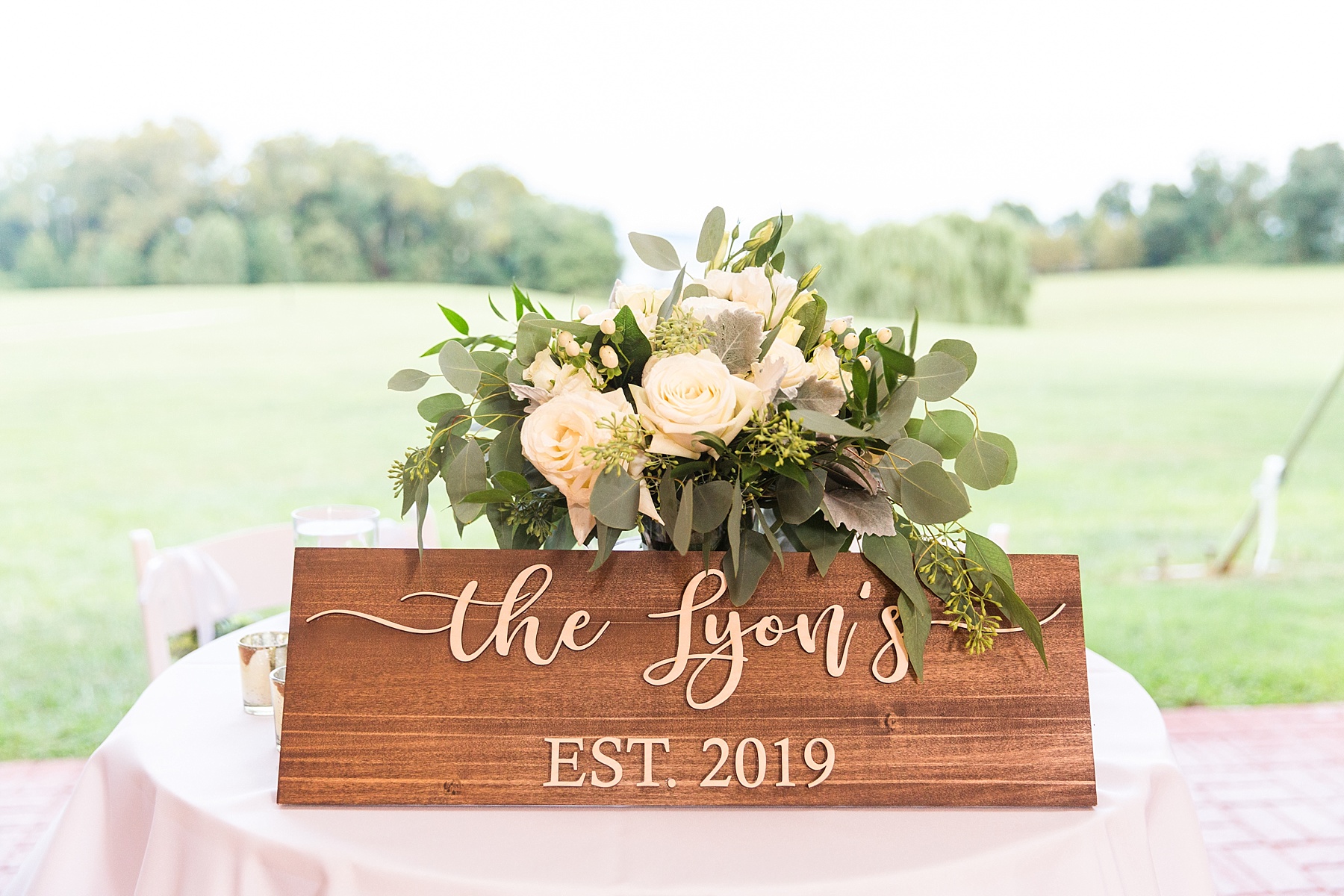 sign for newlyweds at wedding reception photographed by Alexandra Mandato Photography