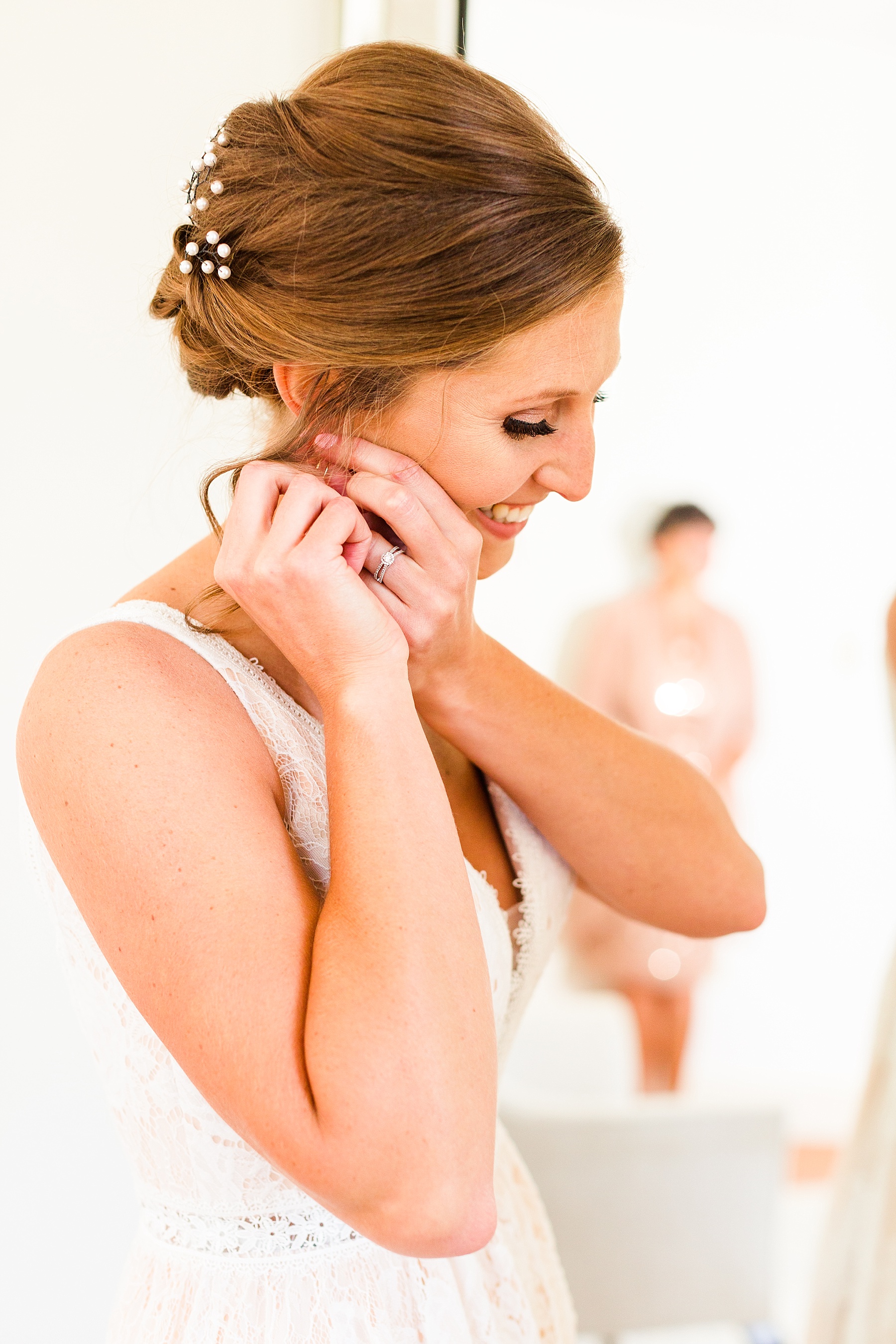 bride prepares for wedding day in Lancaster with Farm at Eagles Ridge Wedding photographed by PA wedding photographer Alexandra Mandato Photography