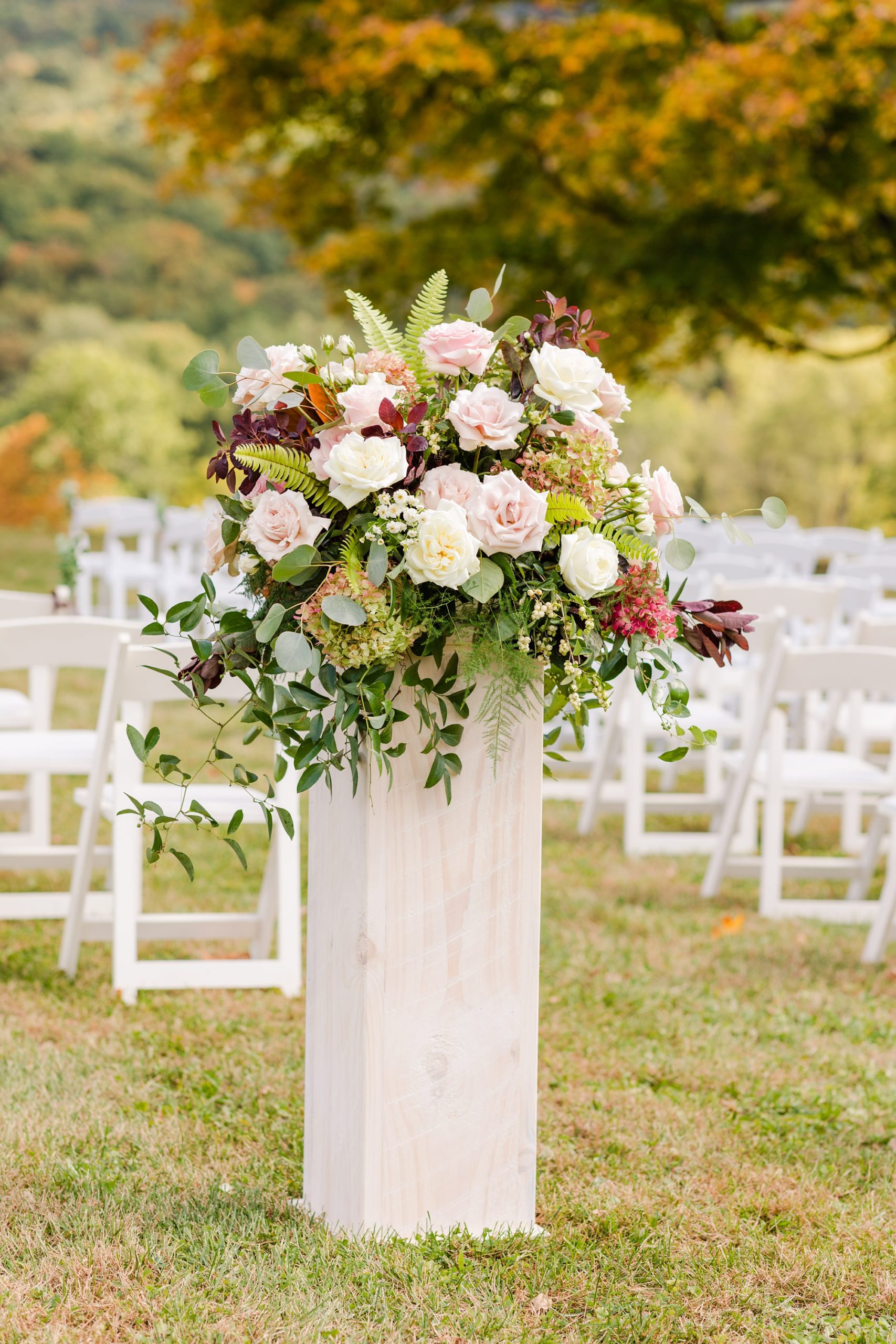 tall floral centerpieces for fall wedding ceremony at Iron Works House