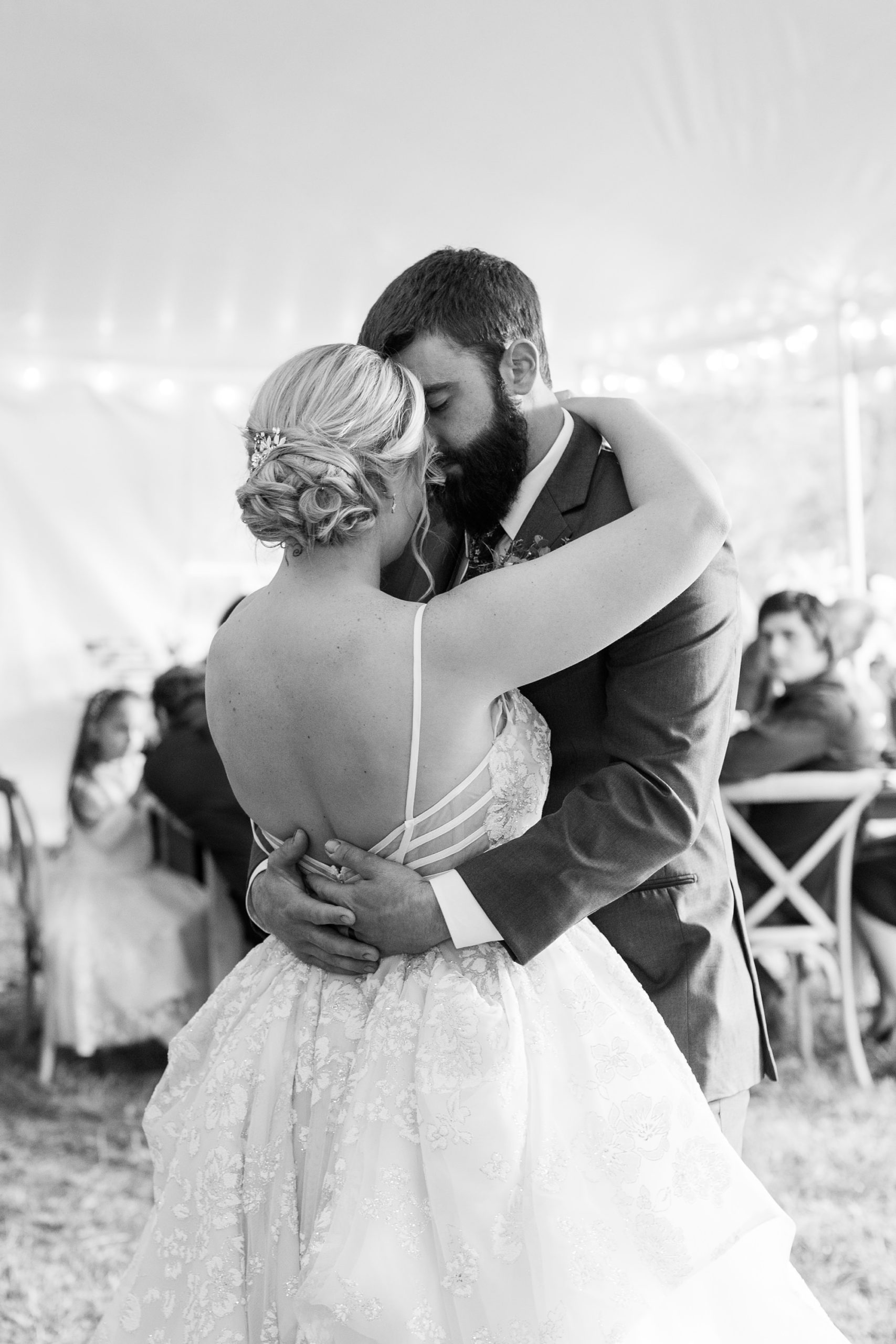 bride and groom dance together during reception