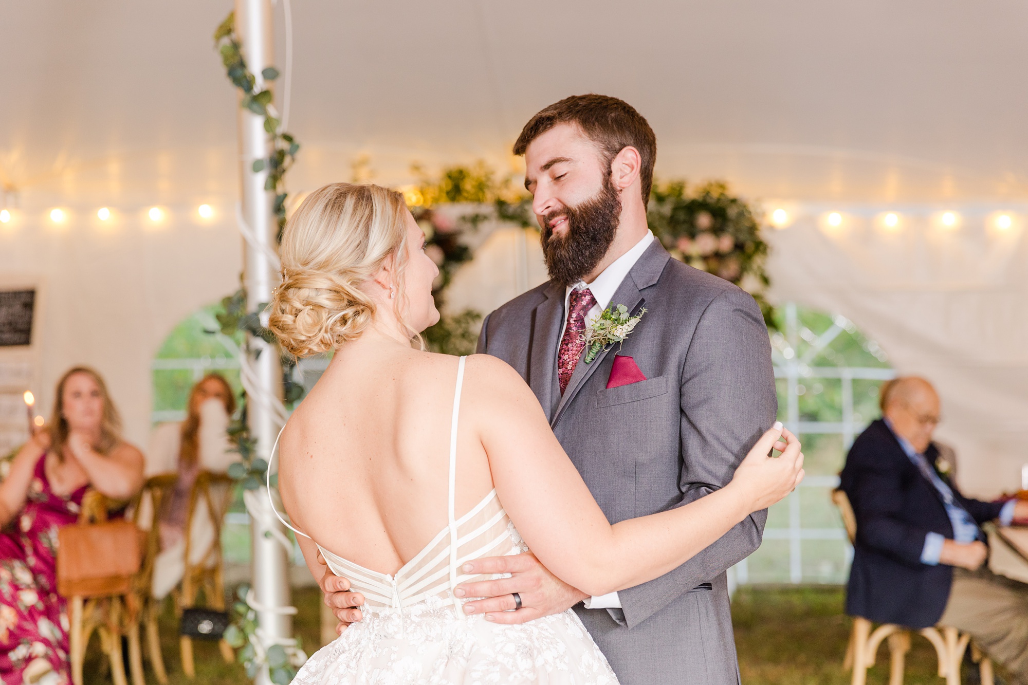 newlyweds laugh during PA wedding reception