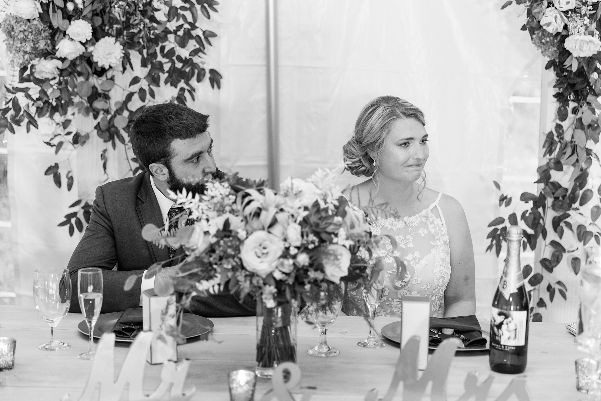 bride and groom listen toasts during Iron Works House wedding reception